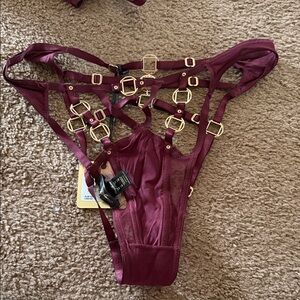 Honey Birdette Jowal in Port Wine Strappy Lingerie with Gold Buckles. NWT
